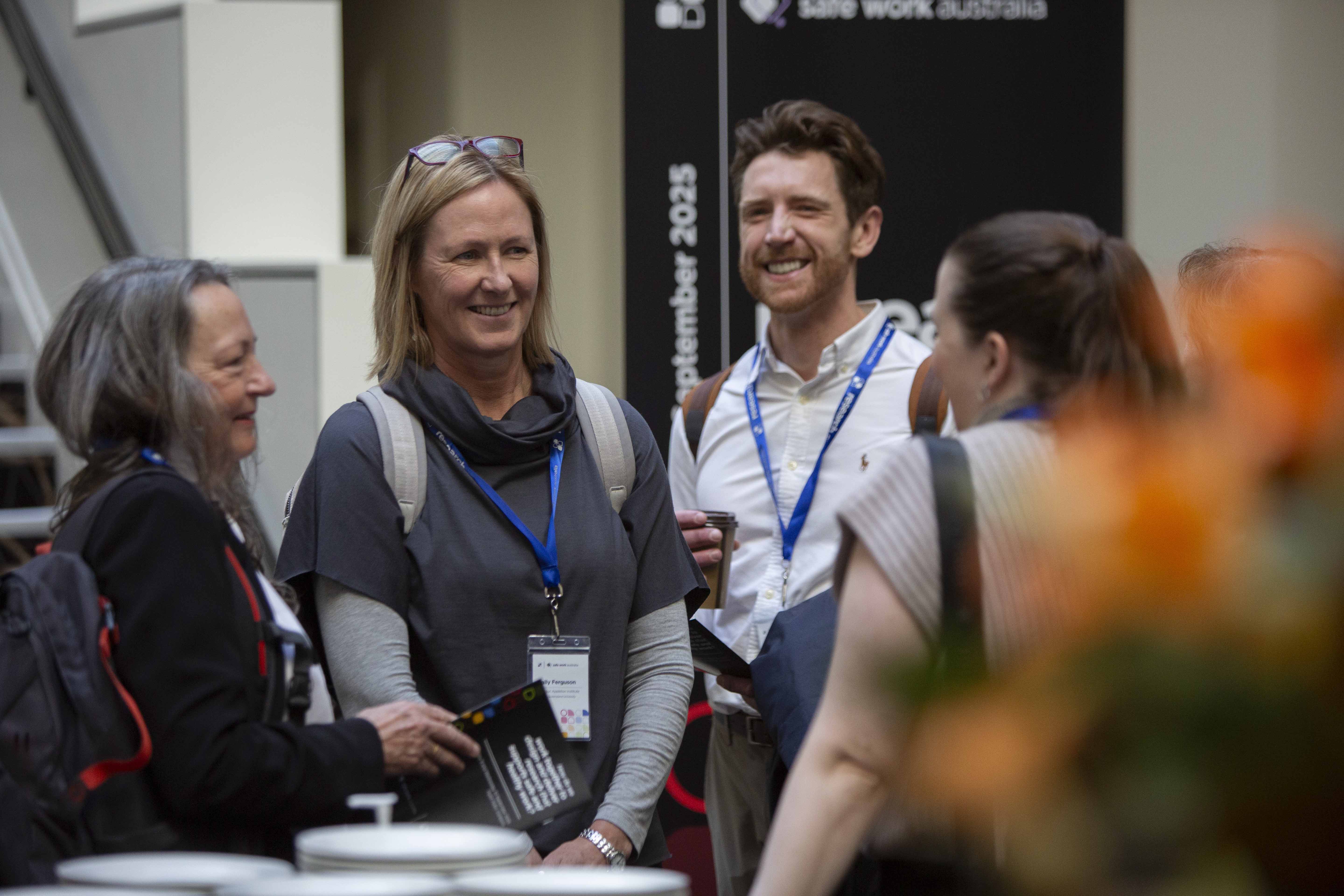 From left to right, Professor Maureen Dollard, Professor Sally Ferguson and Luka Campbell at the Safe Work Australia Research Summit in September.