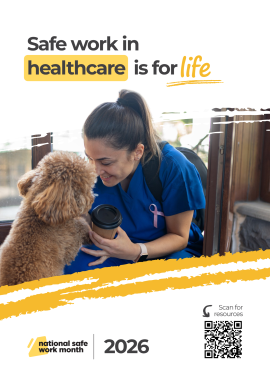 Healthcare worker in scrubs interacting with a dog in a clinical or care setting with the text “Safe work in healthcare is for life”.