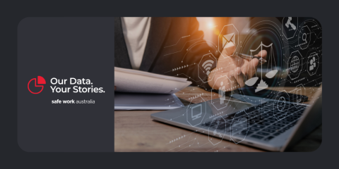 A close up of an individual's hands in front of a laptop looking at data