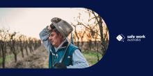 Banner image of a farmer rubbing his head looking fatigued.